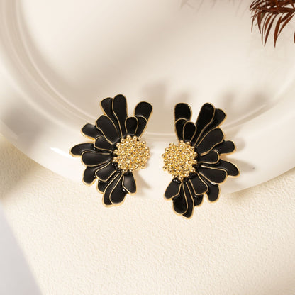 Boucles d’oreilles fleur noire dorée