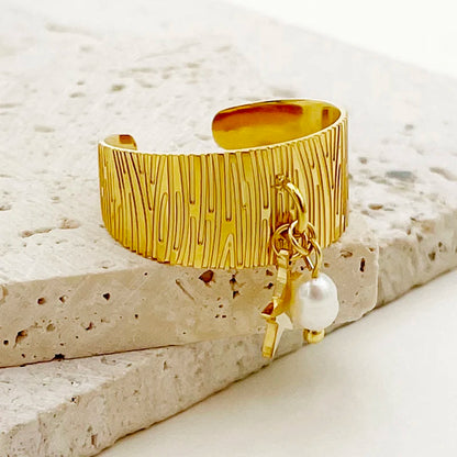 Bague vintage perle et étoile dorée