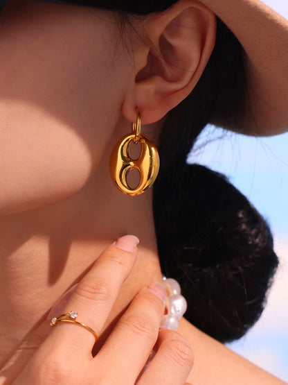 Boucles d’oreilles pendantes “Graine de Café” dorées