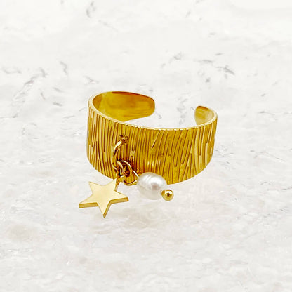 Bague vintage perle et étoile dorée