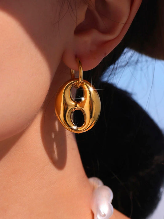 Boucles d’oreilles pendantes “Graine de Café” dorées